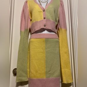 Pastel sweater and skirt. Missing a rhinestone you can see in the picture